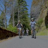 Biking past basalt, Multnomah Falls, Oregon, USA. CC:Ebike Multnomah Falls