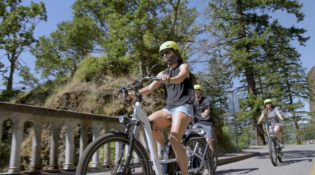 Cycling over a bridge, Multnomah Falls, Oregon, USA. CC:Ebike Multnomah Falls