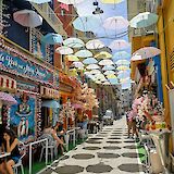 A canopy of umbrellas in Athens. unsplash@MarcoMnoteroPisani