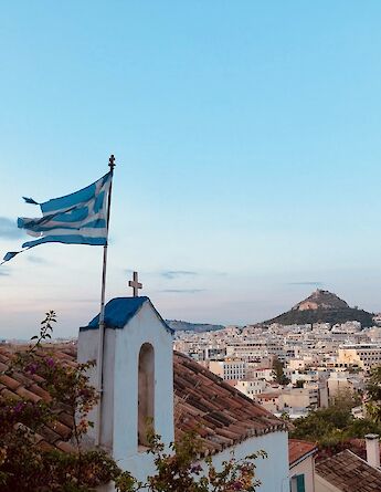 A chapel overlooking the city of Athens. unsplash@MertErbil
