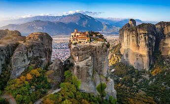 Meteora monasteries atop rock pillars. toABB
