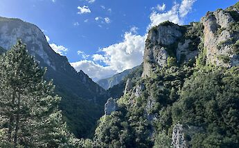 Hiking through a gorge at the foot of Mount Olympus. Unpslash@Anastasius