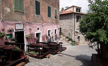 Midday espresso in a small town square. c-toIH