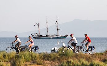 E-bike riders on a coastal route. c-toIH