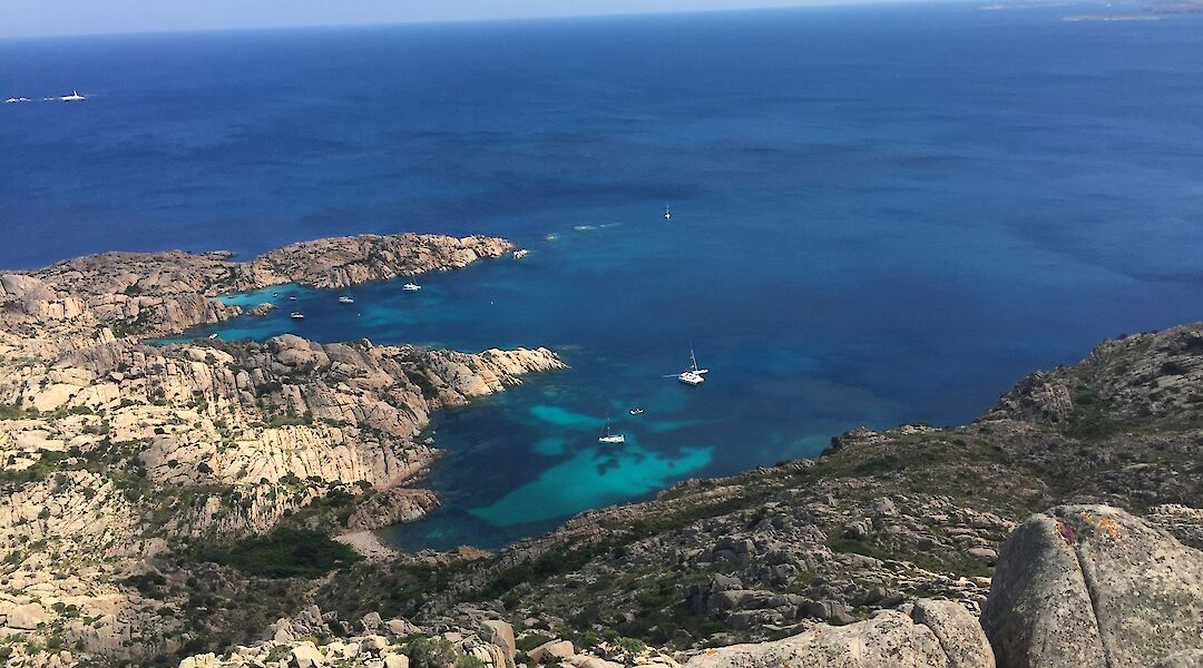 Elba’s rugged coastline and turquoise waters. c-toIH