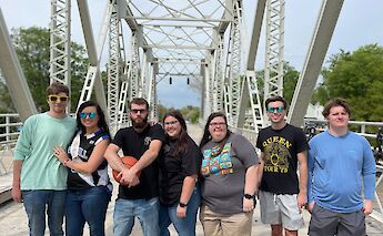 Group photo with a basketball on the Cape Fear Memorial Bridge, Wilmington, North Carolina, USA. CC:TO