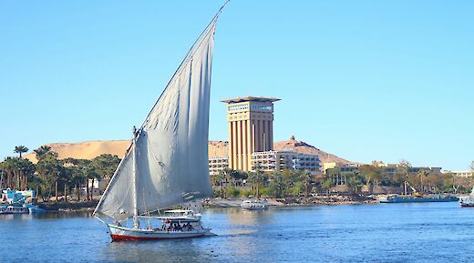 A traditional felucca sailing on the Nile in Aswan. AbdullahHelwa@unsplash