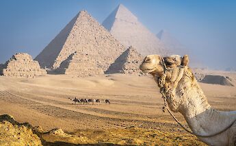 The Great Pyramids of Giza rising from the desert sands. GettyImages@unsplash