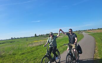 Cycling through the countryside outside Amsterdam, Holland e-bike tour. CC:TO