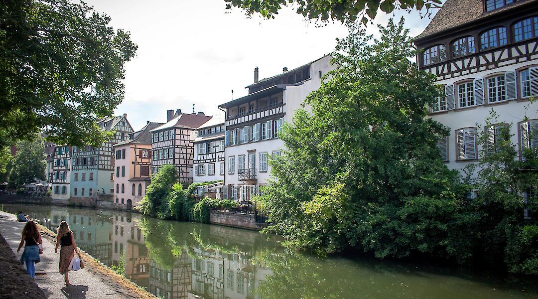 Strolling along the canal, Strasbourg bike tour, France. Kamilla Isalieva@Unsplash