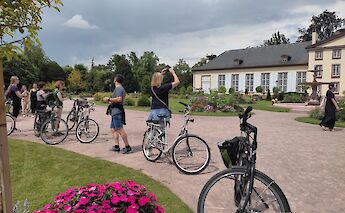 Taking photos in the park, Strasbourg bike tour, France. CC:TO