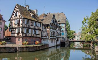 Half-timbered houses of Petite France, Strasbourg bike tour, France. Kamilla Isalieva@Unsplash