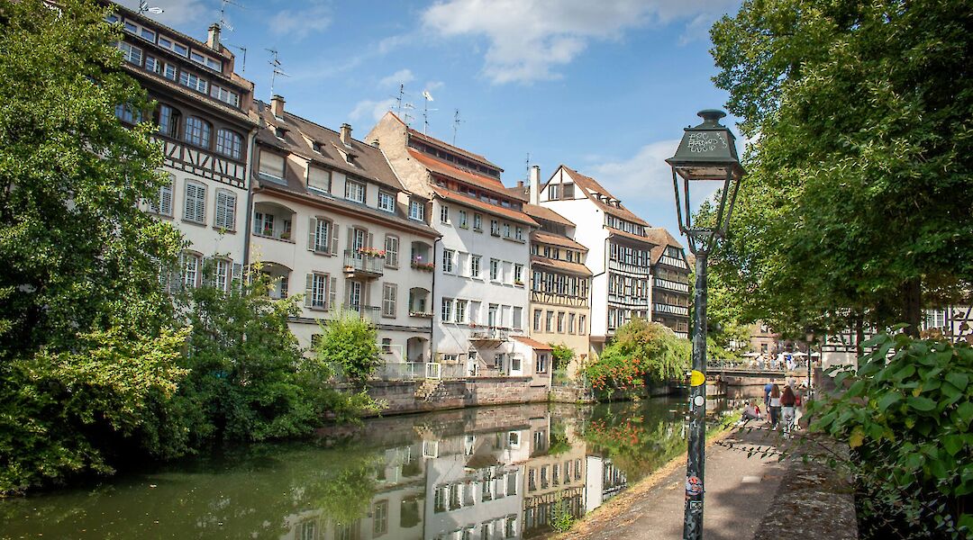 Houses along the canal, Strasbourg bike tour, France. Kamilla Isalieva@Unsplash