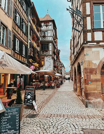 Street cafes, Strasbourg bike tour, France. Nellan@Unsplash