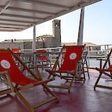 The sundeck offers a welcoming space to unwind, soak up the scenery, and enjoy quiet moments on board.