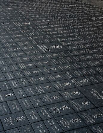 Honorary paving stones at the Ibrox Stadium. Unsplash@Winston Tjia