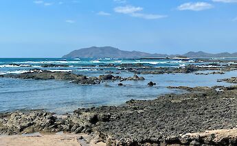 Tamarindo’s rocky coastline with sweeping Pacific views. cc-Heather