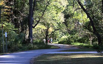 Walkers on the Raleigh greenway trail system, North Carolina. Flickr@Nat Johnson