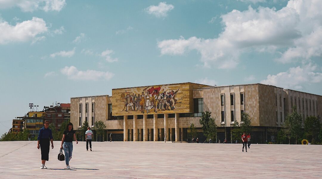 Walking across Skanderbeg Square, Tirana, Albania. B@Unsplash
