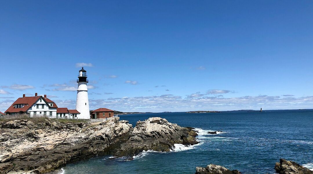 Blue skies above Portland Head Light, Maine, USA. Karson@Unsplash