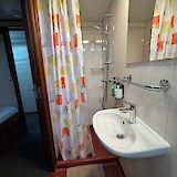 Shower, Clair de Soleil, Bike and Boat Tour