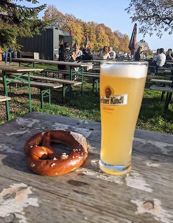 A Berliner Kindl beer and fresh pretzel in a Berlin beer garden. TomBastin@flickr
