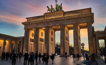 Brandenburg Gate in Berlin at sunset. NorbertBraun@unsplash