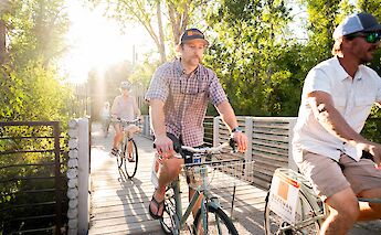 Cycling over a bridge in Bozeman, Montana, USA. CC:TO