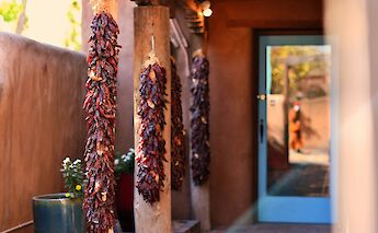 Dried chillies on Canyon Road, Santa Fe, New Mexico, USA. Sean Quillen@Unsplash