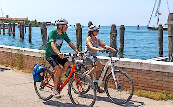 Cycling along the waterfront near Venice. toGL
