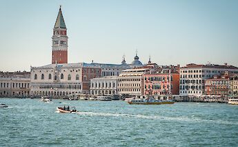 View across the water toward St. Mark&rsquo;s Campanile in Venice. toGL