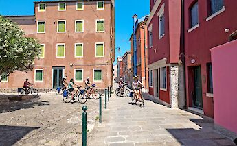 Quiet streets and colorful buildings on a Venetian island. toGL