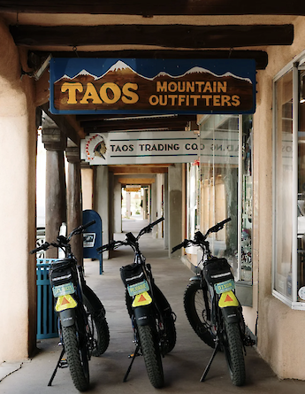 E-bikes lined up ready for the Taos e-bike tour, New Mexico, USA. CC:TO