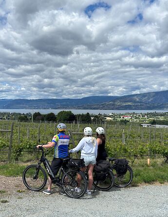 Views of a lake and vineyards on the winery e-bike tour. CC:TO